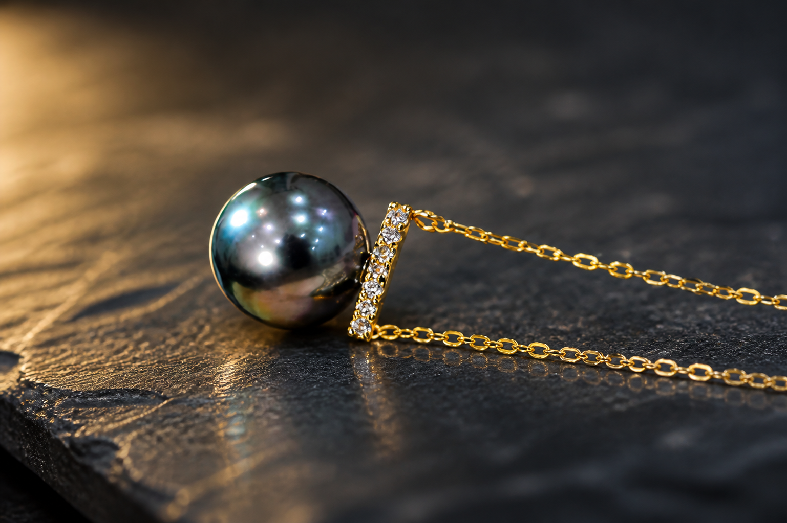 Close-up of peacock green pearl sterling silver necklace
