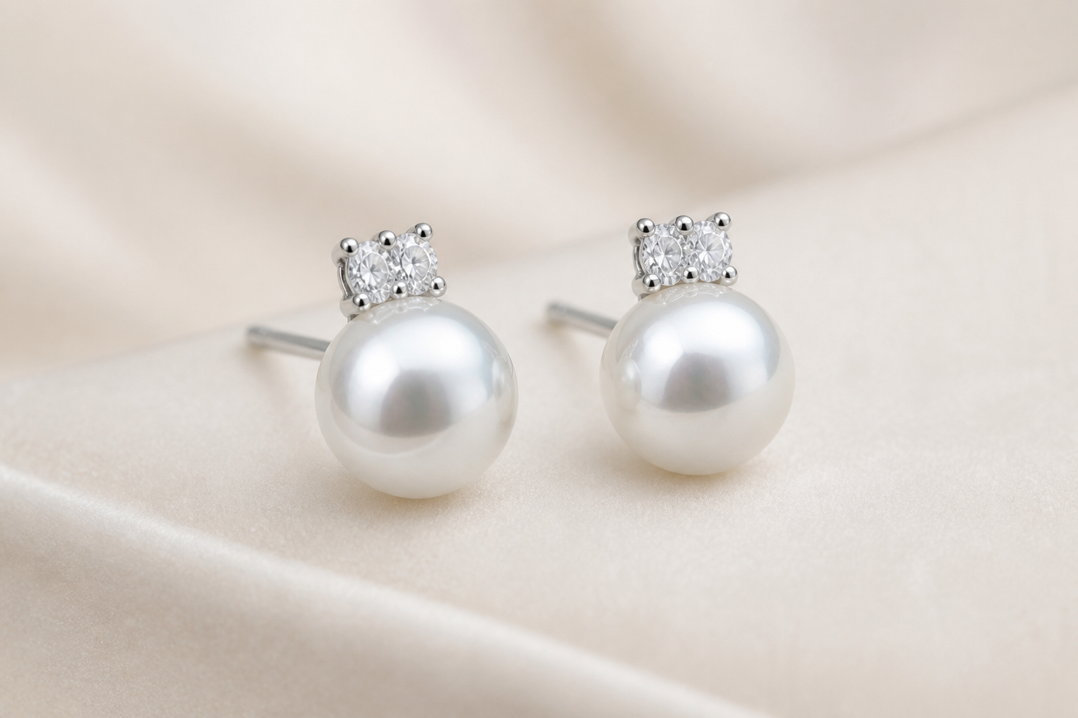 Close-up of freshwater pearl stud earrings in sterling silver